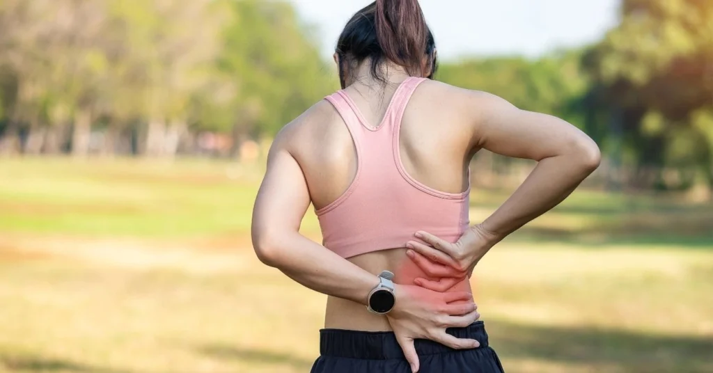 young-woman-experiencing-back-pain-possibly-requiring-spinal-decompression-therapy