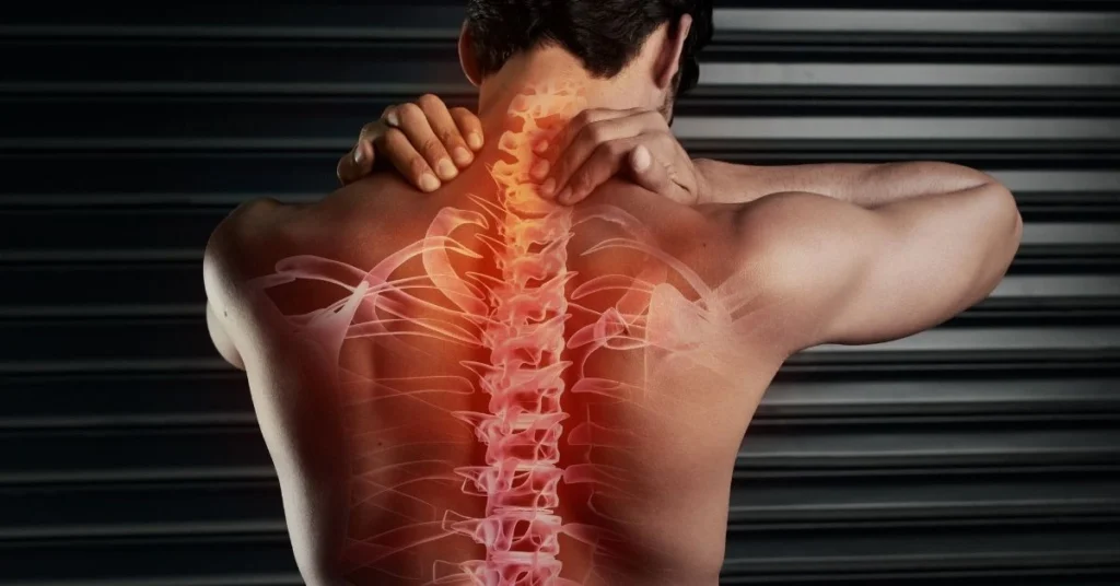 man-holding-neck-with-glowing-spine-illustration-showing-spinal-decompression-pain-relief-by-a-chiropractor
