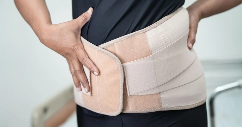 close-up-of-a-person-wearing-a-supportive-lower-back-brace